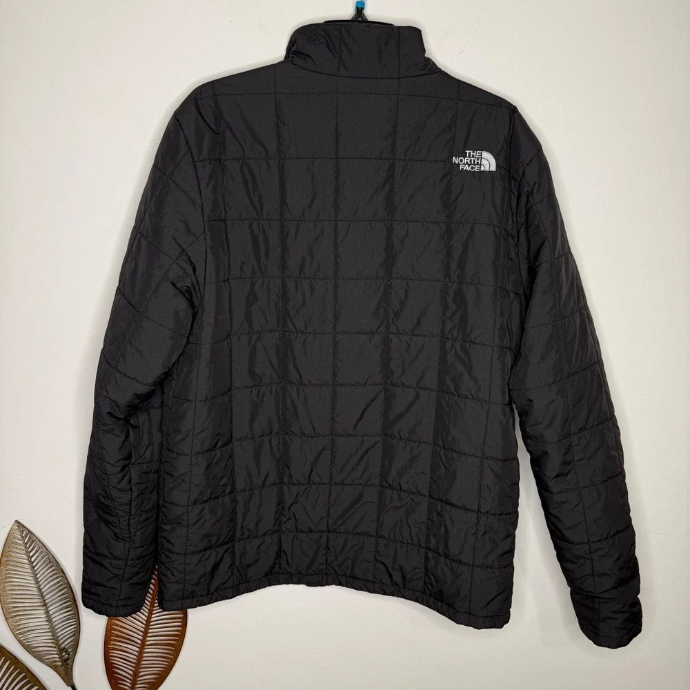 The North Face size pit